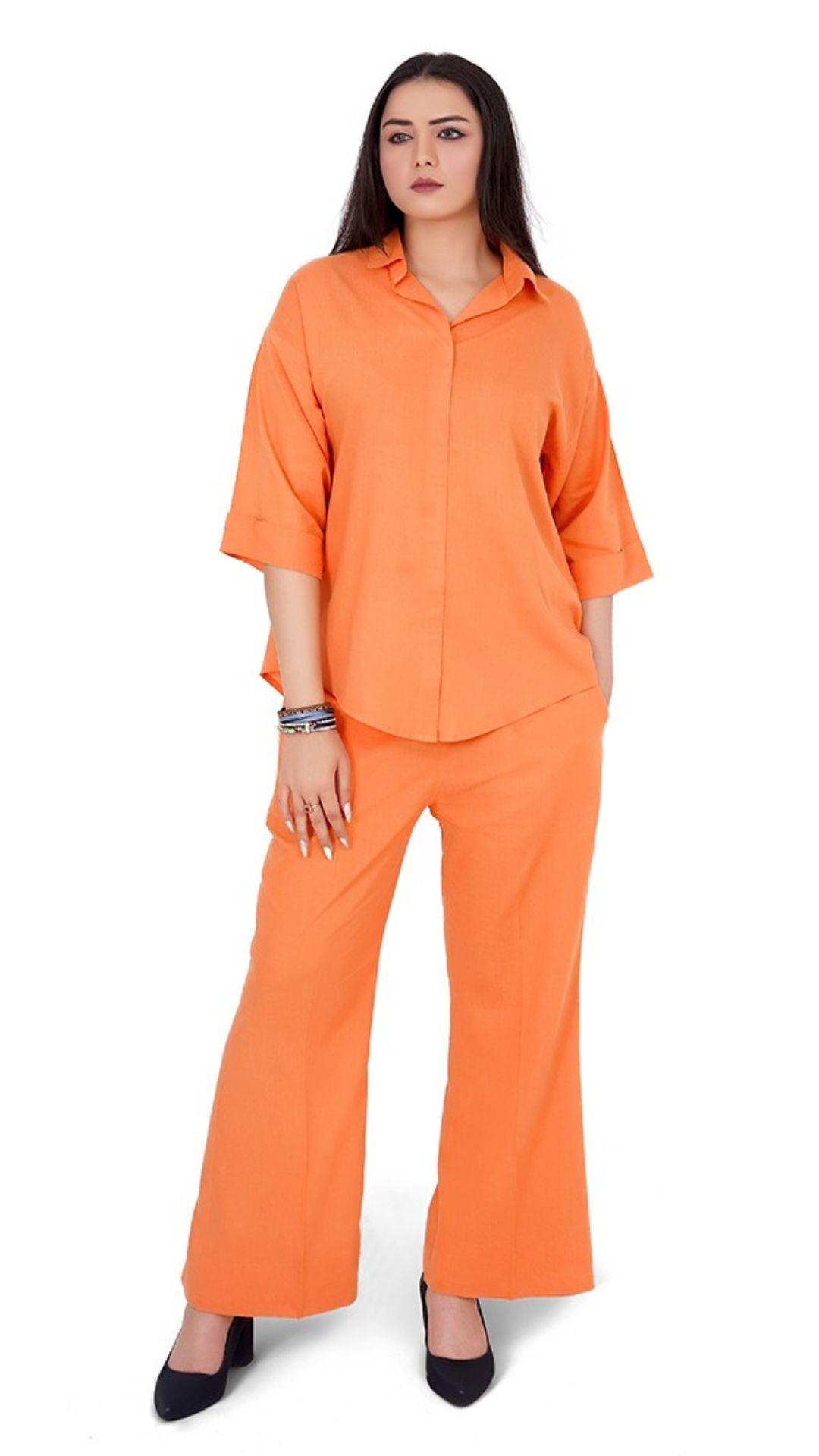 Woman wearing an orange outfit on a white background