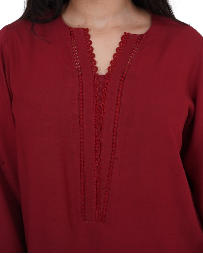 Maroon kurta with subtle V-neck detailing and full sleeves – women's Pakistani casual suit close-up breathable fabric