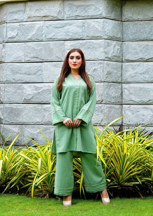 Woman in Shadow Shenaz Irish linen suit with thread frill sleeves and wide leg palazzo pants – elegant Pakistani ethnic wear