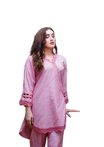 Woman wearing a pink traditional outfit on a white background